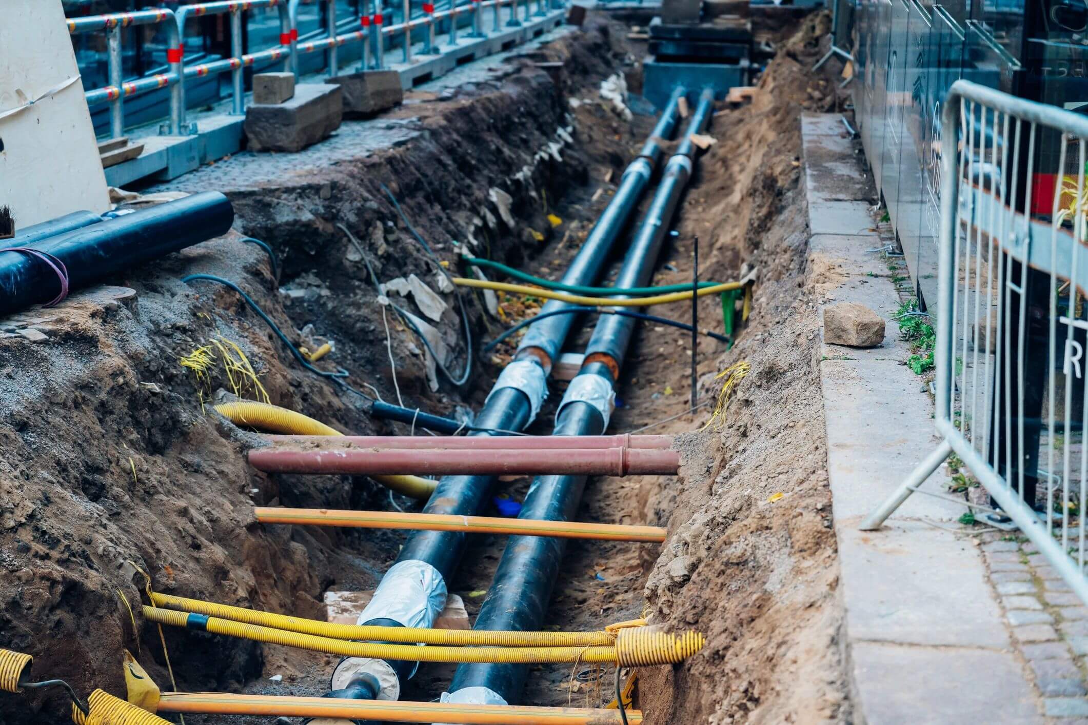 Underground pipes in a construction trench.